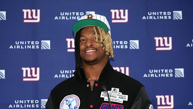 Xavier McKinney at a press conference.
